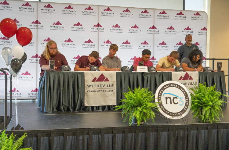 Justin Quesenberry with students